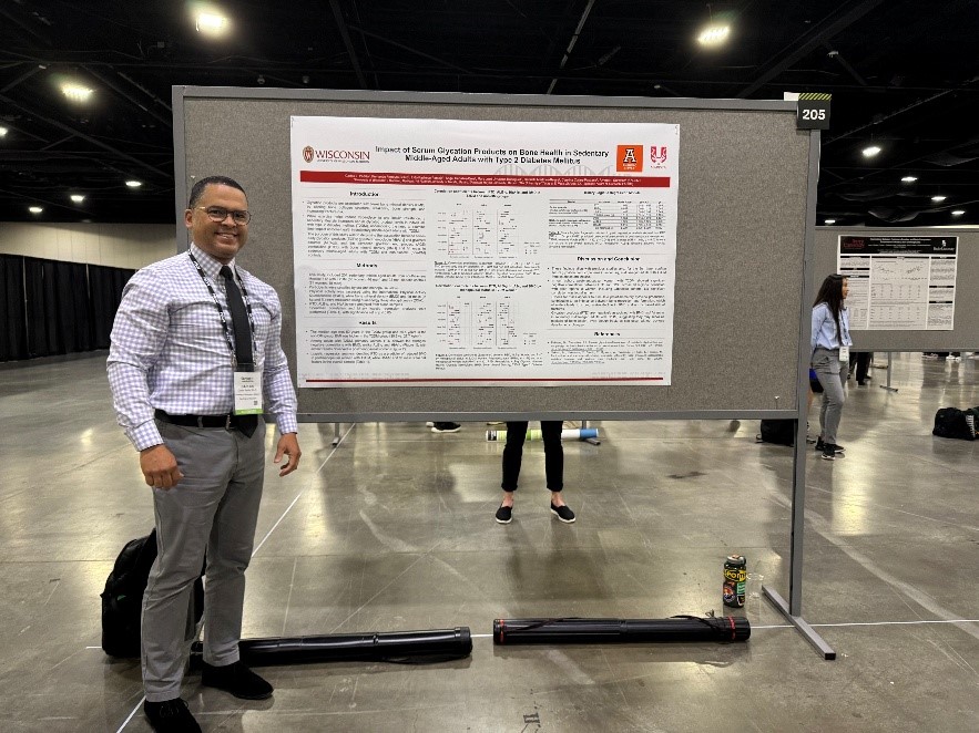 Padilla standing in front of a board with results